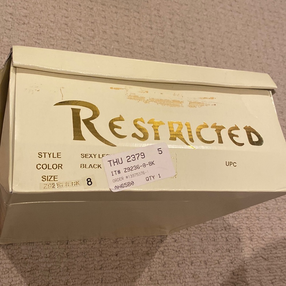 Restricted black boots